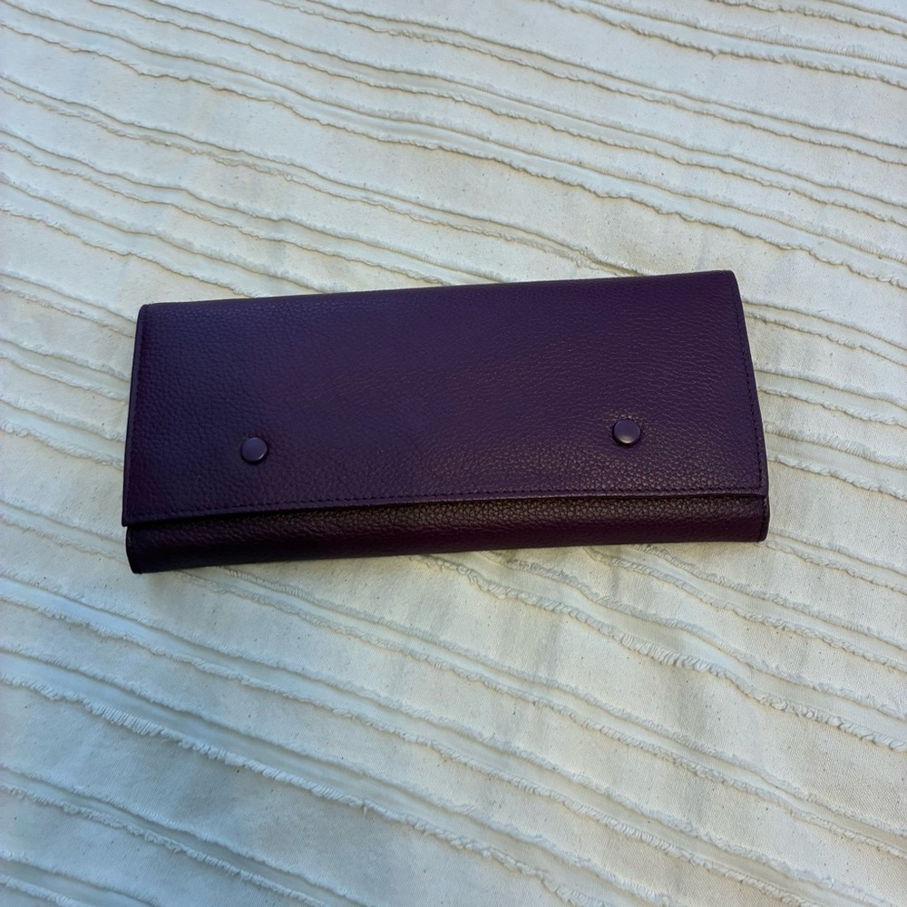 Leather jewelry roll. Purple. Perfect for travel! Keeps your jewelry tidy!